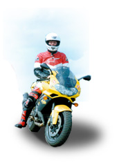 Mike Newman on the motorbike he used to break his first world record in 2001